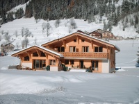 Location Pralognan la Vanoise : vue de la terrasse avec les pistes à l'arriere