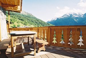 Location Val d'Isere : Grande terrasse orientée sud.